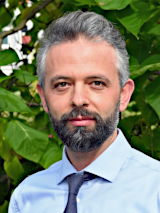 Dr. Gjergji Sinani